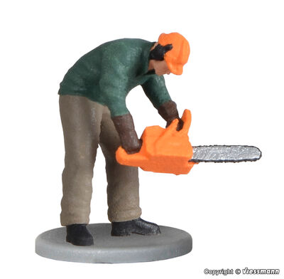 Viessmann H0 - 1548 - H0 Waldarbeiter mit Kettensäge, bewegt - Artikelbild