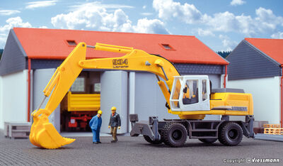 Kibri H0 - 11261 - H0 LIEBHERR 934 Litronic mit Radfahrwerk - Artikelbild